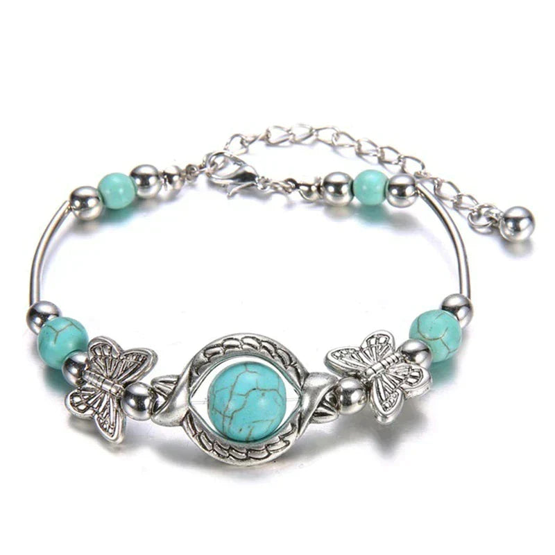 Bracelet de perles de papillon turquoise avec breloques très détaillées