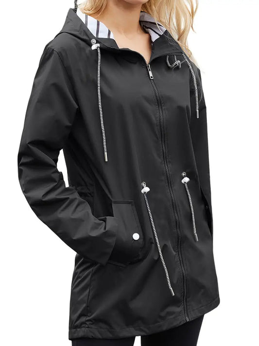 Veste de pluie imperméable stylée avec capuche et poches pour femmes | Parfait pour les activités de plein air en automne/hiver