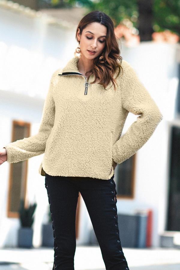 Pull pour femmes avec col rabattu et fermeture à glissière sur le devant